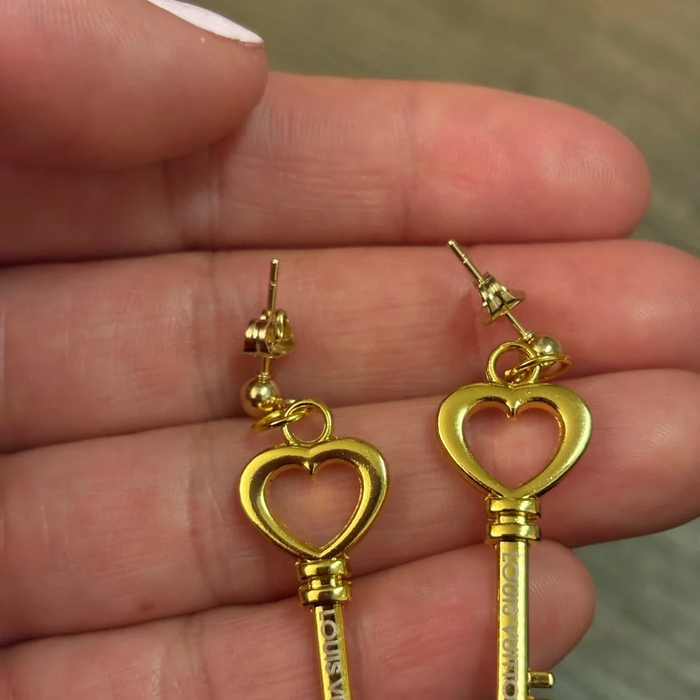 Gold lv earrings